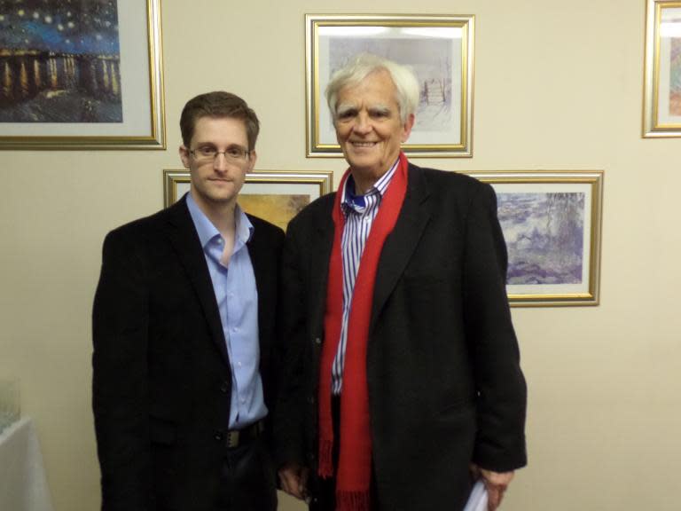 This handout photo made available on the webpage of German Green party parliamentarian Hans-Christian Stroebele shows Stroebele (R) posing for a photo with Edward Snowden at an undisclosed location in Moscow, on October 31, 2013