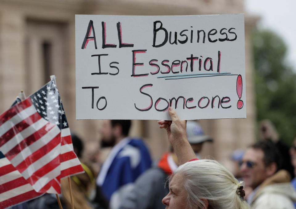 Protesters rally at the Texas State Capitol to speak out against Texas' handling of the COVID-19 outbreak, in Austin, Texas, Saturday, April 18, 2020. Austin and many other Texas cities remain under stay-at-home orders due to the coronavirus outbreak except for essential personnel. (AP Photo/Eric Gay)