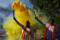 Bharatiya Janata party (BJP) supporters celebrate lead for the party in Gujarat state elections in Gandhinagar, India, Thursday, Dec. 8, 2022. Indian Prime Minister Narendra Modi’s Hindu nationalist party is all set to keep its 27-year-old control of his home Gujarat state in a record state legislature win. (AP Photo/Ajit Solanki)