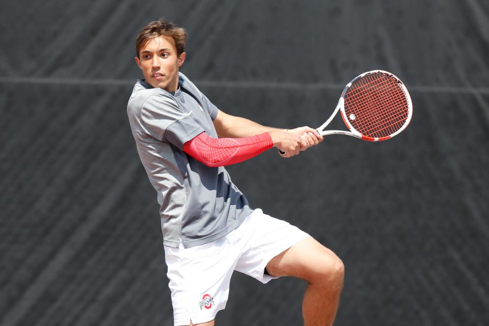 Ohio State's JJ Tracy won in both singles and doubles on Sunday as the Buckeyes defeated Louisville.