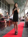 The 20-year old cuts a slim figure in her tight black number. (Yahoo! Singapore/ Deborah Choo)