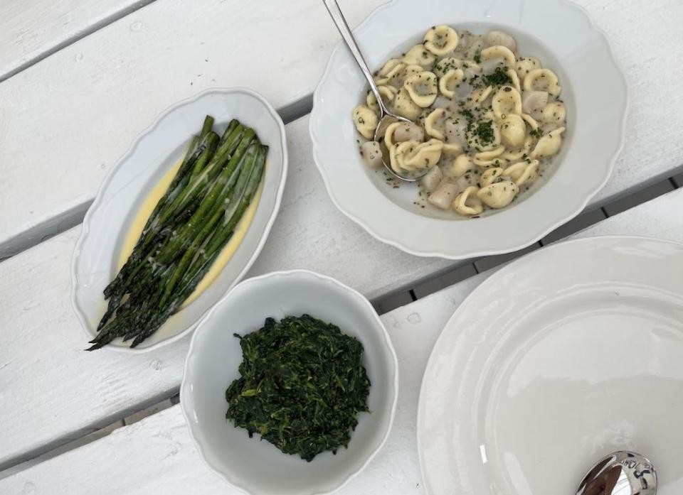 spinach, asparagus on plates