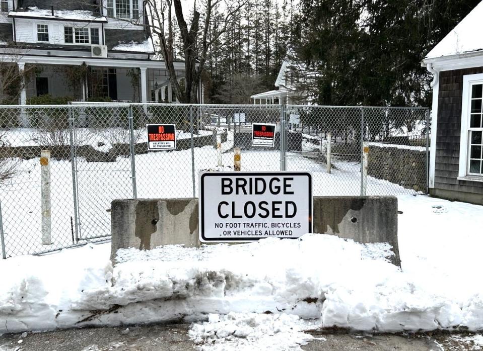 Dighton officials closed a pedestrian bridge on Briggs Street because of structural issues and they will decide whether to replace it with a motor vehicle overpass or pedestrian bridge.