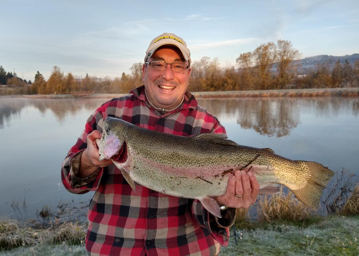 Tom Finkle of Salem caught this 29-inch, 10-pound hatchery brood rainbow trout on Nov. 21 using garlic-scented PowerBait at Sheridan Pond. The pond is one of several stocked recently by the Oregon Department of Fish and Wildlife with brood trout from Roaring River Hatchery near Scio.
