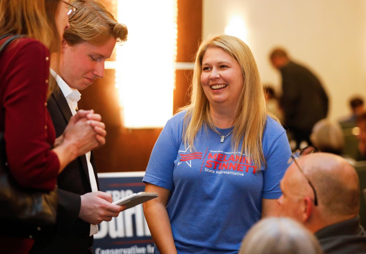 Rep. Melanie Stinnett talks with supporters at the Greene County GOP watch party on Tuesday, Nov. 8, 2022.