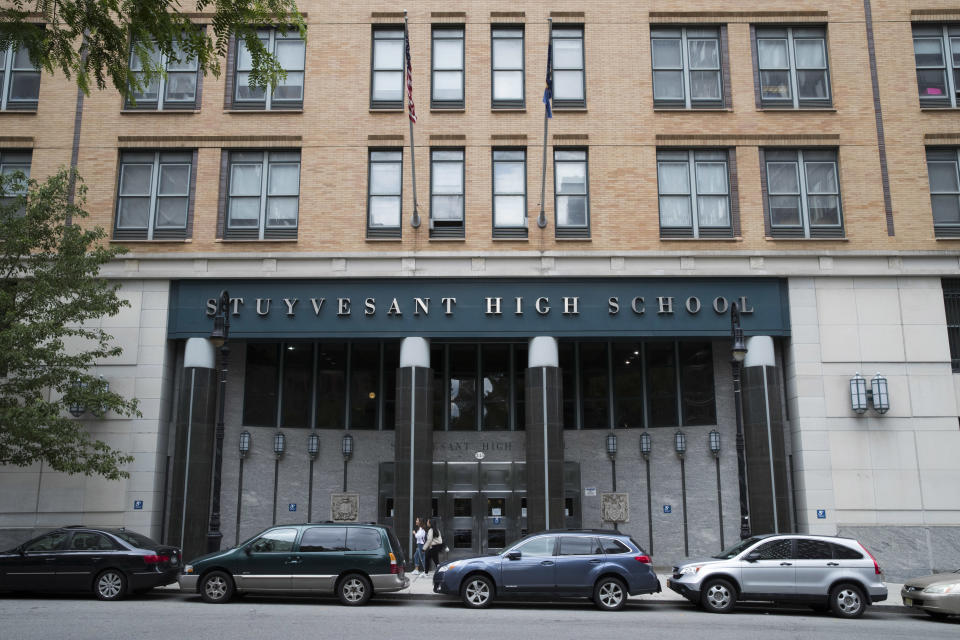 FILE- This June 6, 2018 file photo shows Stuyvesant High School in New York. Schools across New York began the 2019-2020 academic year with a new tool intended to prevent student suicides or violence: The ability to ask a court to cut off gun access for pupils who might be dangerous to themselves or others. (AP Photo/Mary Altaffer, File)