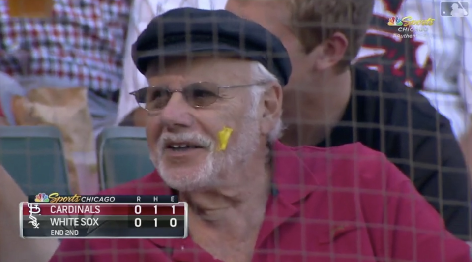 It was dollar dog night at the White Sox game, and this fan enjoyed himself so much that he left a mustard souvenir on his face for later. (MLB.com)