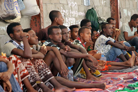 African migrants sit in a deportation center in Aden, Yemen March 17, 2018. Picture taken March 17, 2018. REUTERS/Fawaz Salman