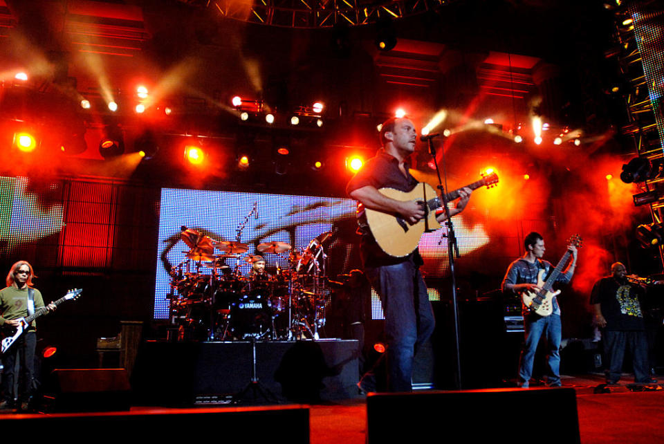 the band performing on stage