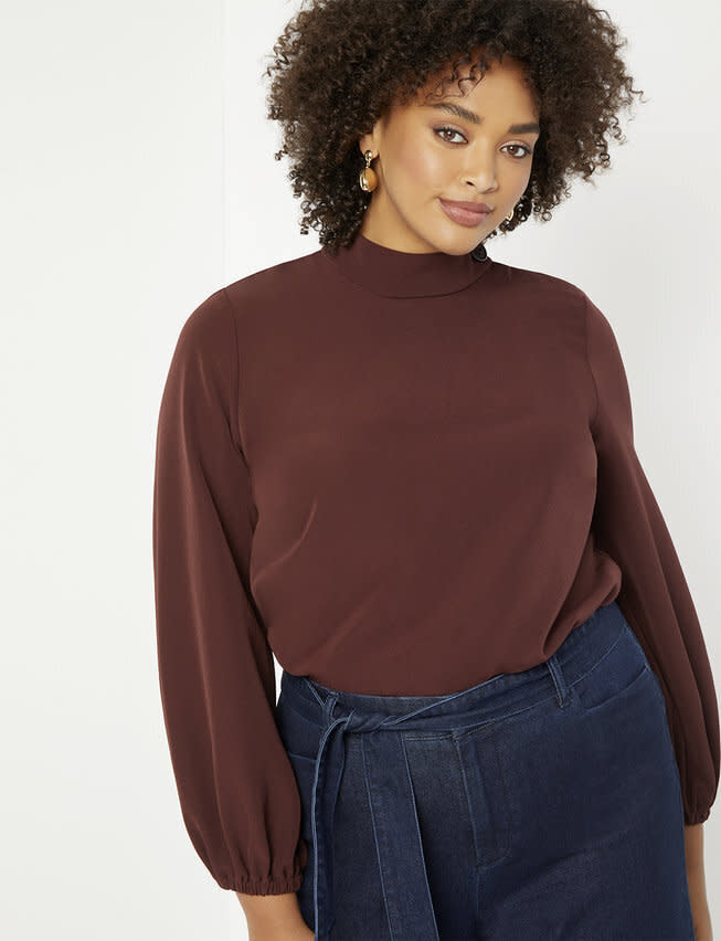 Get the<a href="Button Collar Blouse with Puff Sleeve" target="_blank" rel="noopener noreferrer"> Eloquii button collar blouse with puff sleeve for $39.99&nbsp;</a>