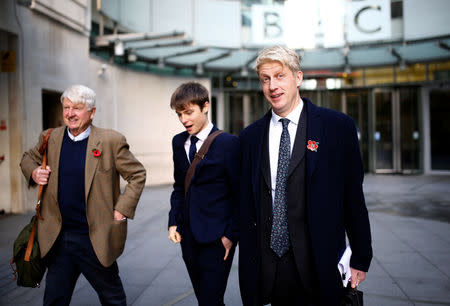 British Member of Parliament, Jo Johnson and his father Stanley Johnson, leave the BBC's Broadcasting House, in London, Britain November 10, 2018. REUTERS/Henry Nicholls