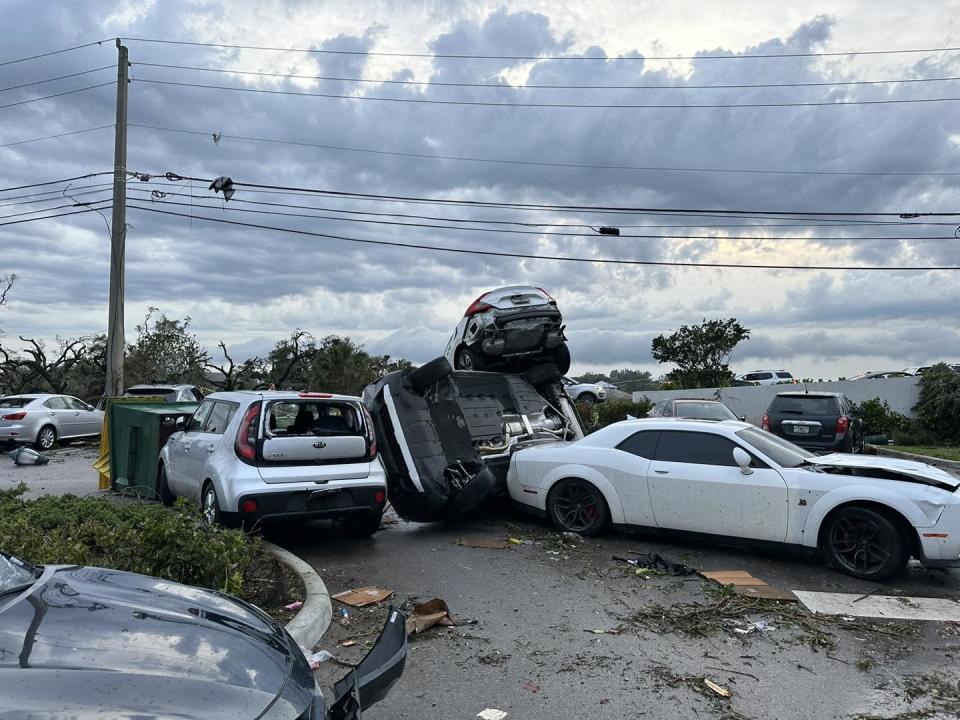 A tornado touched down near Palm Beach Gardens, Florida, on Saturday afternoon, flipping cars and downing trees as well as power lines. / Credit: City of Palm Beach Gardens City Hall / Facebook