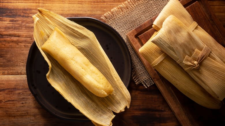 tamale in opened corn husk