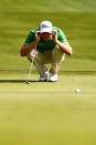 CHARLOTTE, NC - MAY 05: Nick Watney of the United States lines up his putt on the 15th hole during the third round of the Wells Fargo Championship at the Quail Hollow Club on May 5, 2012 in Charlotte, North Carolina. (Photo by Mike Ehrmann/Getty Images)