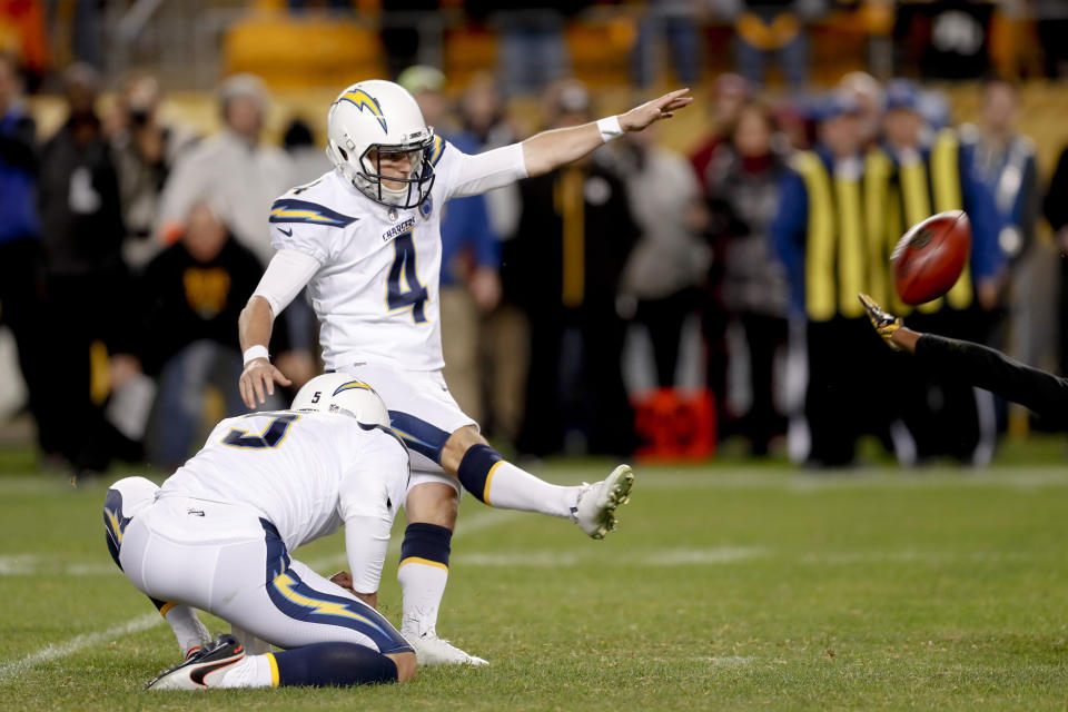 Los Angeles Chargers kicker Mike Badgley (4) hits a field goal from the hold by Donnie Jones to defeat the Pittsburgh Steelers 33-30 with no time left in an NFL football game, Sunday, Dec. 2, 2018, in Pittsburgh. (AP Photo/Don Wright)