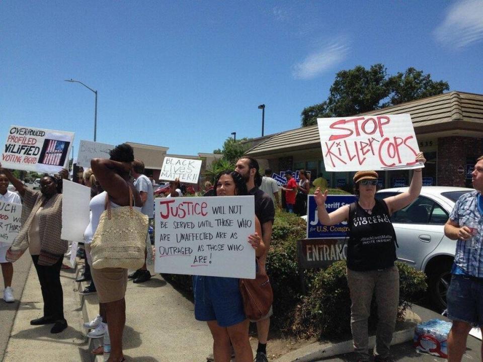 Local activists affiliated with the Black Lives Matter movement protest outside Sheriff Scott Jones’ congressional campaign office in Carmichael on Saturday, July 9, 2016.