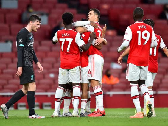 Arsenal celebrate their second goal, scored by Reiss Nelson (2020 Pool)