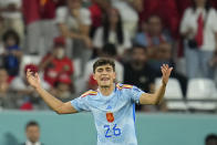 Spain's Pedri reacts after his team missed a scoring chance during the World Cup round of 16 soccer match between Morocco and Spain, at the Education City Stadium in Al Rayyan, Qatar, Tuesday, Dec. 6, 2022. (AP Photo/Julio Cortez)