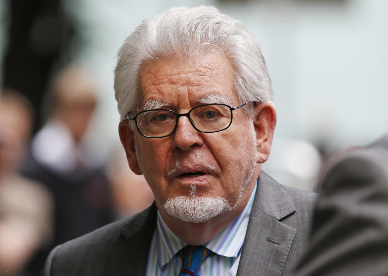 Veteran entertainer Rolf Harris leaves the Southwark Crown Court in London, Monday, June 30, 2014. A jury Monday found Australian-born Harris guilty of 12 counts of indecent assault.The 84-year-old was convicted of indecent assault on four victims aged 19 or under between 1968 and 1986. (AP Photo/Lefteris Pitarakis)