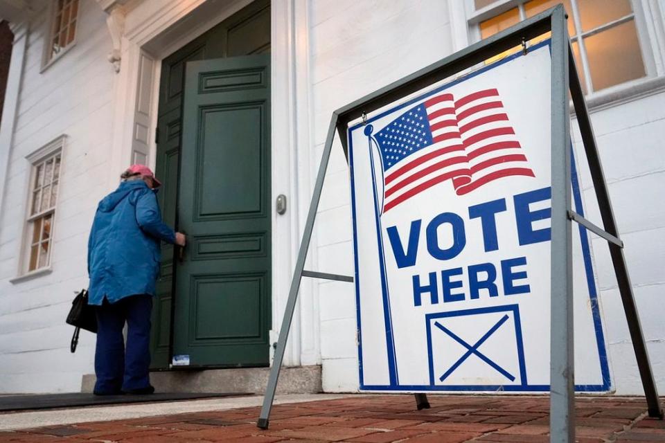A voter enters the polling station in Kennebunk, Maine, Tuesday, March 5, 2024. Super Tuesday elections are being held in 16 states and one territory. Hundreds of delegates are at stake, the biggest haul for either party on a single day. (AP Photo/Michael Dwyer)