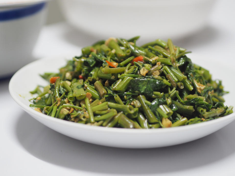 A classic Vietnamese vegetable dish, stir-fried water spinach is quite simply made by stir-frying water spinach (also called morning glory) with oil, garlic, oyster sauce, and some sugar. It's sometimes served with a protein option. Water spinach is also popular throughout Asia as a vegetable side.