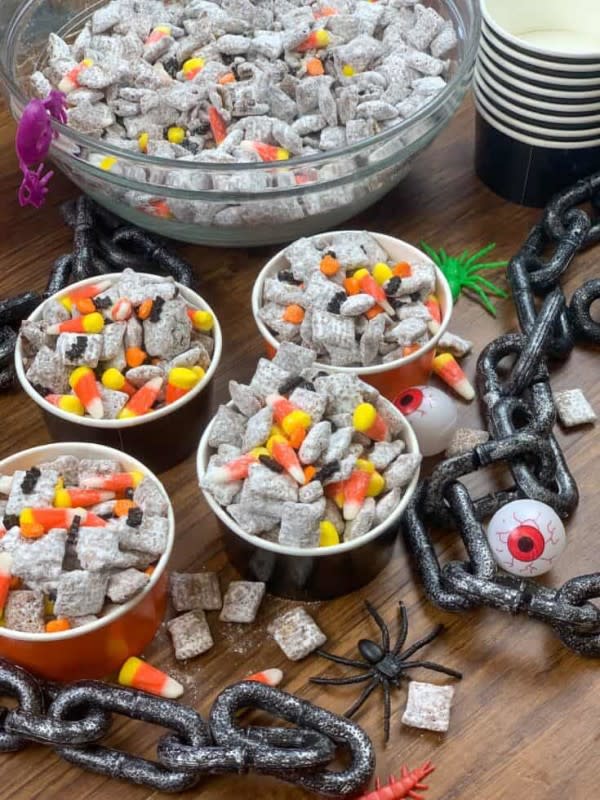 <p>Back to My Southern Roots</p><p>A Midwestern classic, updated for the spookiest night of the year. </p><p><strong>Get the recipe: <a href="https://www.backtomysouthernroots.com/halloween-muddy-buddies/" rel="nofollow noopener" target="_blank" data-ylk="slk:Halloween Muddy Buddies;elm:context_link;itc:0;sec:content-canvas" class="link ">Halloween Muddy Buddies</a></strong></p>