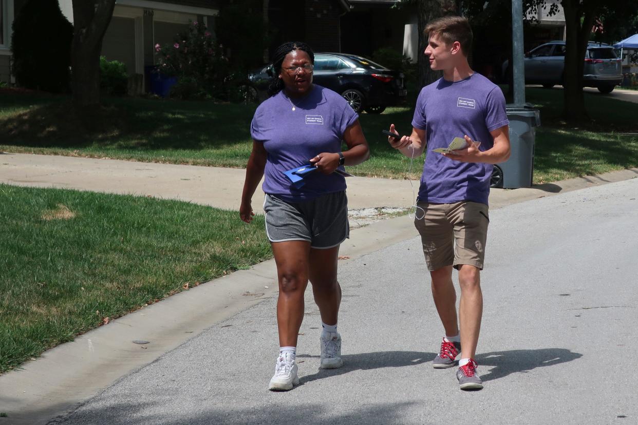 Student canvassers from Susan B. Anthony Pro-Life America go door to door in Olathe, Kansas, on July 8, 2022, to talk to prospective voters about a proposed amendment to the Kansas Constitution.