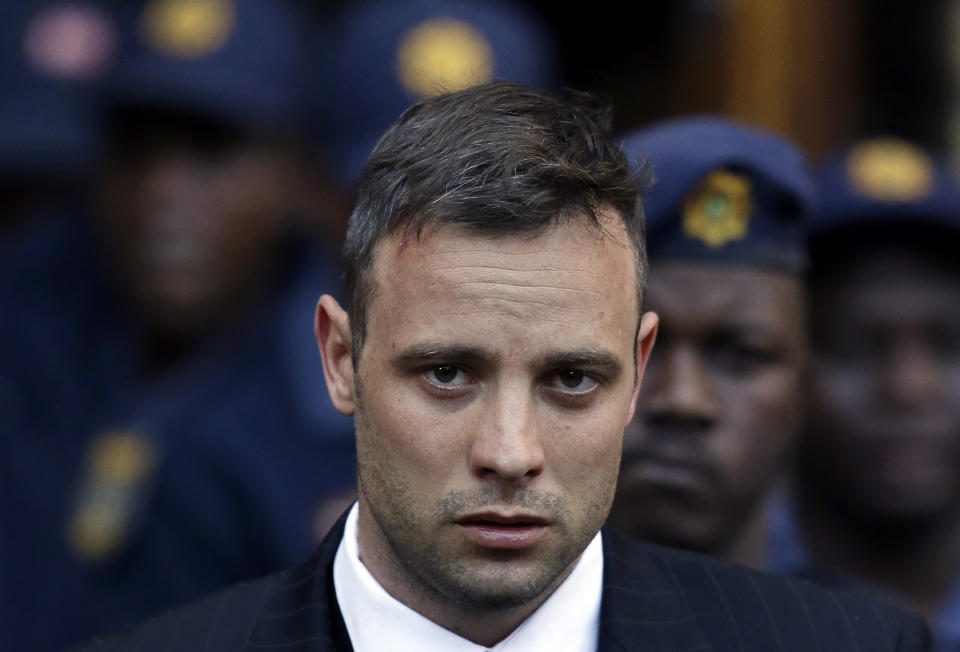 FILE - Oscar Pistorius leaves the High Court in Pretoria, South Africa, Wednesday, June 15, 2016, after his sentencing proceedings. Pistorius could be granted parole on Friday, Nov. 24, 2023 after nearly 10 years in prison for killing his girlfriend. The double-amputee Olympic runner was convicted of a charge comparable to third-degree murder for shooting Reeva Steenkamp in his home in 2013. He has been in prison since late 2014. (AP Photo/Themba Hadebe, File)