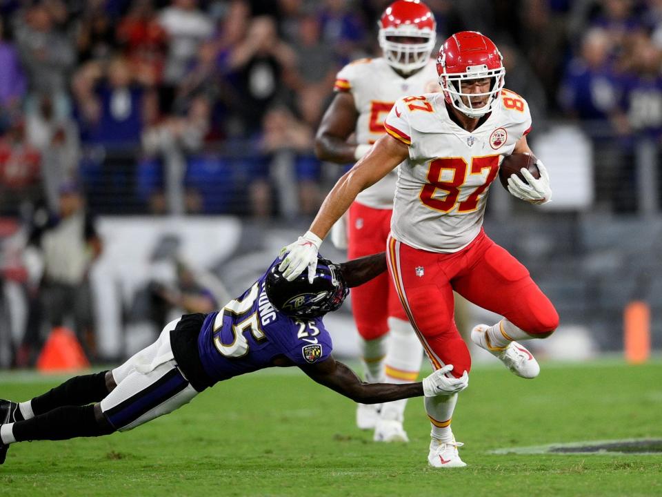 Travis Kelce makes a play against the Baltimore Ravens.