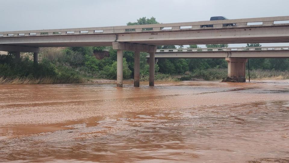 The Canadian River is seen Friday north of Amarillo. According to the National Weather Service Amarillo office, the river 19 miles north of the city at the U.S. Highway 287 bridge was in flood stage early Friday after Thursday's heavy rain, impacting dirt roads near the river from the bridge downstream to Rosita Creek Flats Recreation Area. The river crested at 8.24 feet. The last time the river was this high was in August 1996 when it crested at 7.69 feet, NWS said.