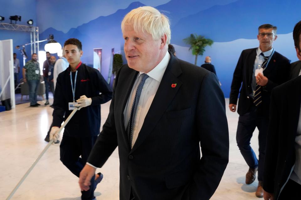 Former British prime minister Boris Johnson attends Cop27 UN Climate Summit on 7 November 2022 (AP)