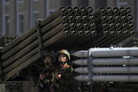 Soldiers sit on a rocket launcher vehicle during a parade for the 70th anniversary of North Korea's founding day in Pyongyang, North Korea, Sunday, Sept. 9, 2018. North Korea staged a major military parade, huge rallies and will revive its iconic mass games on Sunday to mark its 70th anniversary as a nation. (AP Photo/Ng Han Guan)