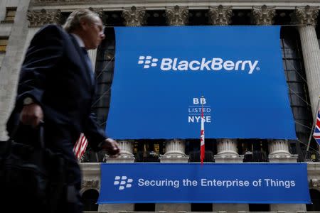 FILE PHOTO - A banner for BlackBerry Ltd hangs to celebrate the company's transfer trading to the New York Stock Exchange (NYSE) in New York, U.S., October 16, 2017. REUTERS/Brendan McDermid