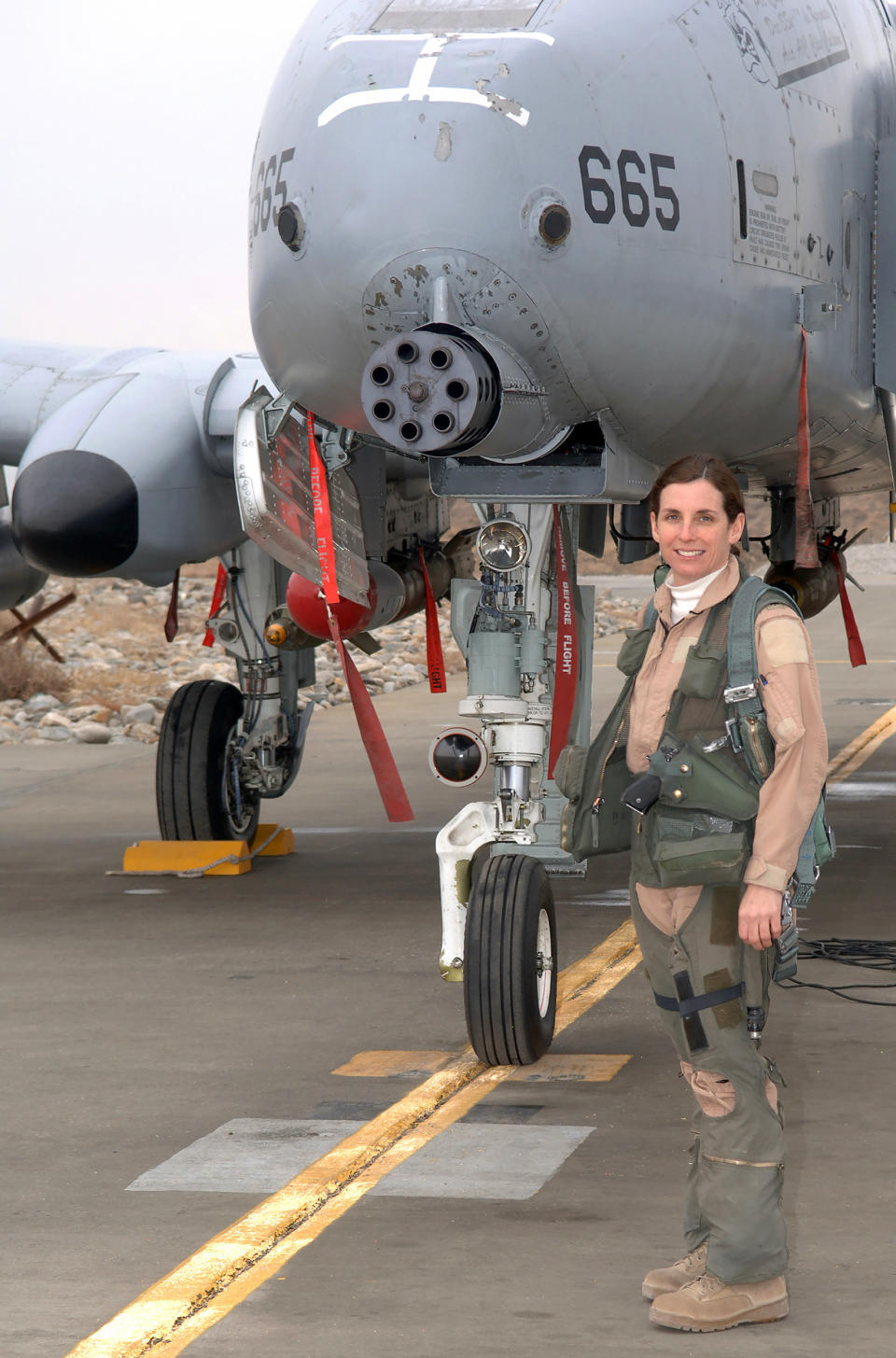 Lt. Col. Martha McSally stands with her A-10 Thunderbolt II aircraft. The colonel is the first female pilot in the Air Force to fly in combat and to serve as a squadron commander of a combat aviation squadron. (Donaldson Collection / Getty Images)