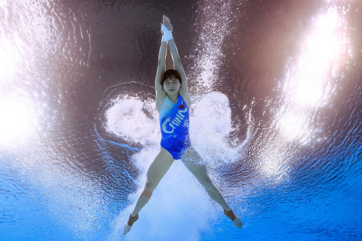 An underwater view shows China's Quan Hongchan competing in the women's 10m platform diving preliminary during the Paris Olympics on Sunday.