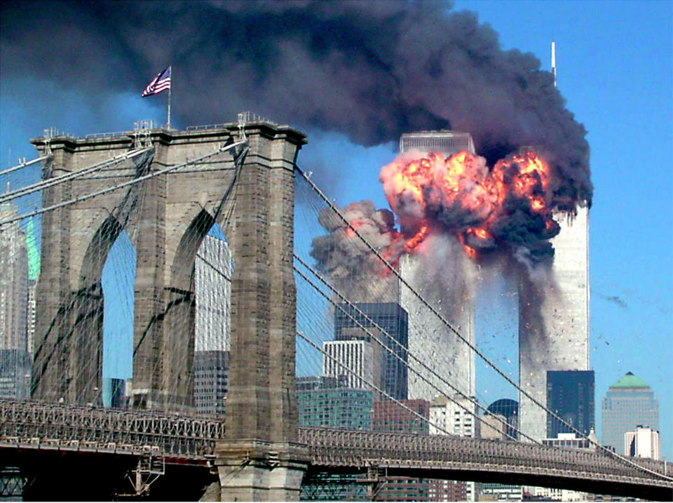 The second tower of the World Trade Center bursts into flames after being hit by a hijacked airplane on Sept. 11, 2001. (Sara K. Schwittek/Reuters)