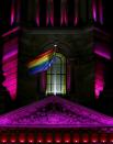 <p>A rainbow flag is seen at Sydney Town Hall to remember victims of the Orlando nightclub massacre, June 13, 2016, in Sydney. (Daniel Munoz/Getty Images) </p>