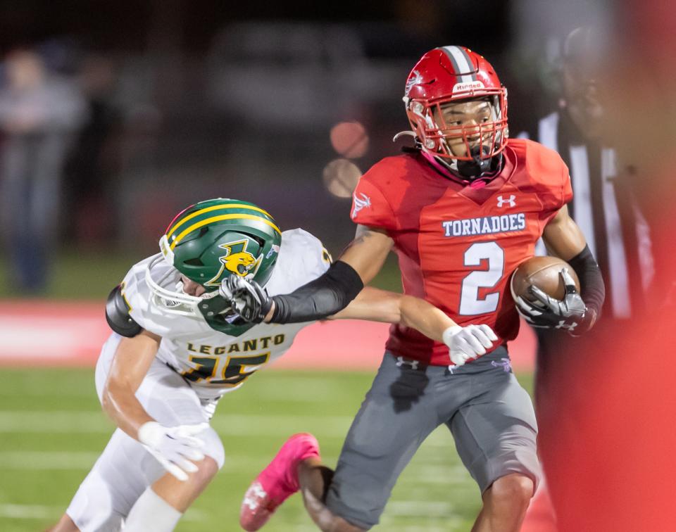 Bradford Chalil Cummings (2) tries to shake off Lecanto Nathan Vonderhaar (15) as Bradford takes on Lecanto at Bradford High School in Starke, FL on Friday, October 20, 2023. [Alan Youngblood/Gainesville Sun]