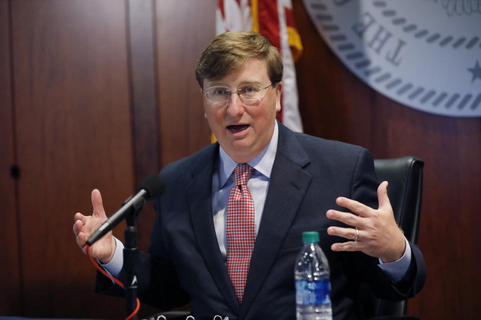 Mississippi Gov. Tate Reeves expresses his concern over the growing number of people testing positive with coronavirus statewide, during a press briefing with members of the state's COVID-19 response team, Monday, July 20, 2020, in Jackson, Miss. (AP Photo/Rogelio V. Solis)