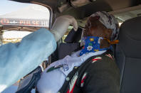 FILE — In this May 22, 2020, file photo, an elderly woman reacts as a heath worker collects a sample to test for COVID-19 in Katlehong, Johannesburg, South Africa. South Africa’s reported coronavirus are surging. Its hospitals are now bracing for an onslaught of patients, setting up temporary wards and hoping advances in treatment will help the country’s health facilities from becoming overwhelmed. (AP Photo/Themba Hadebe, File)