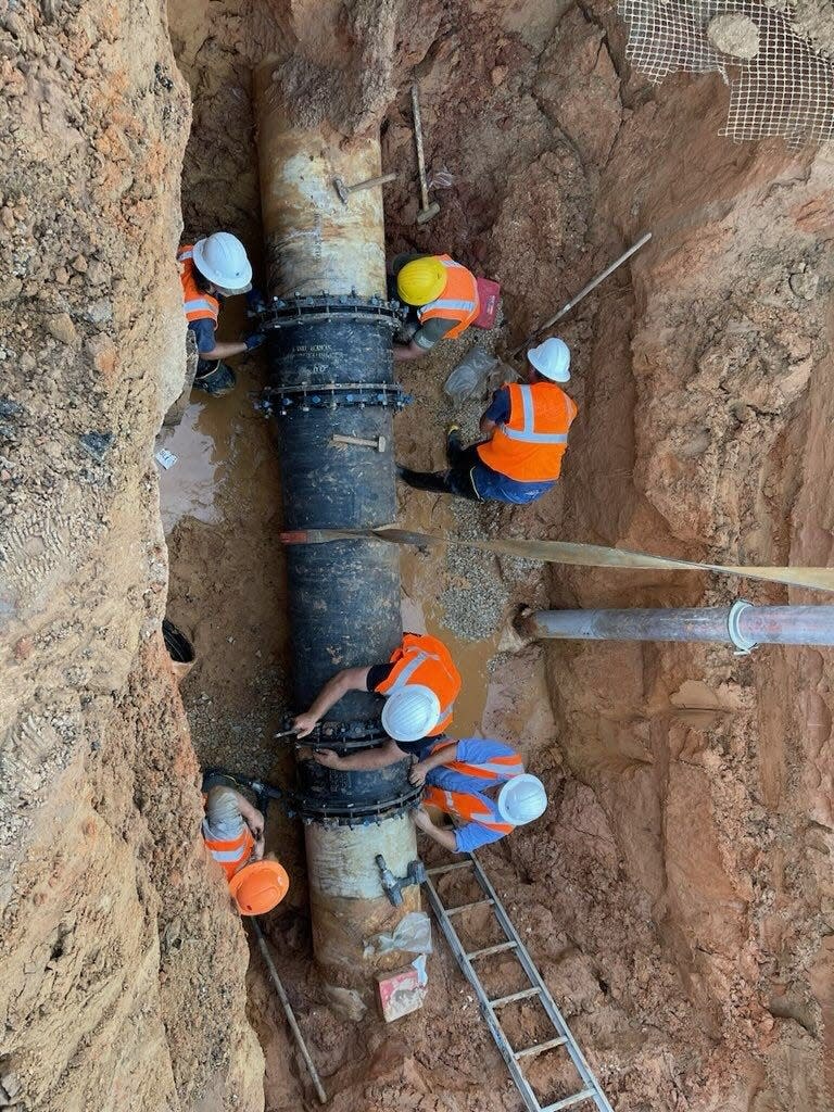 After isolating the source of a sewage spill and diverting the flow, crews repaired the 10-foot-deep force main and returned flow to the pipe underneath Capital Circle Northeast.