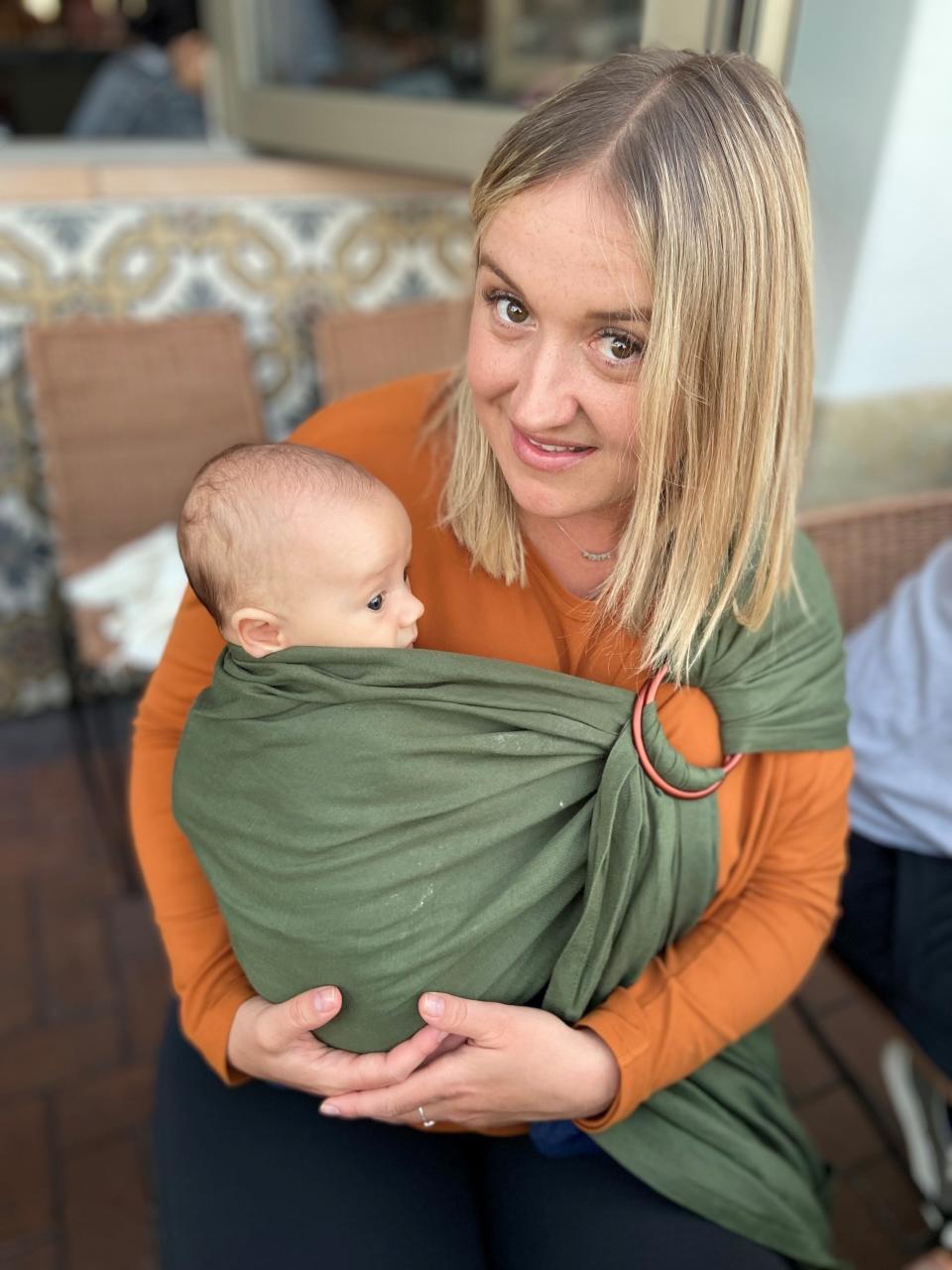 Veronica Nolan of Carlsbad, California holds her baby, James Leo. She was one of the first mothers to use the Emulait baby bottle.