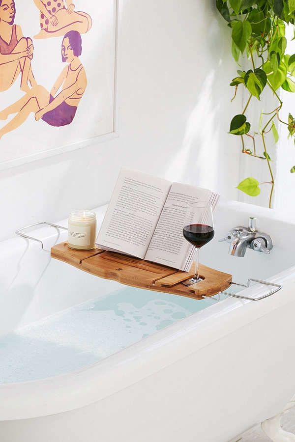 <a href="https://www.urbanoutfitters.com/shop/me-time-bamboo-bath-tray-caddy" target="_blank">Shop it here</a>.&nbsp;