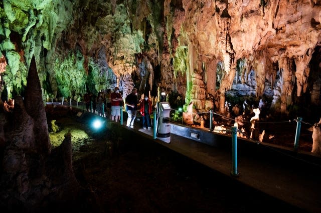 Persephone guides visitors inside the Alistrati cave, north-east of Thessaloniki, Greece