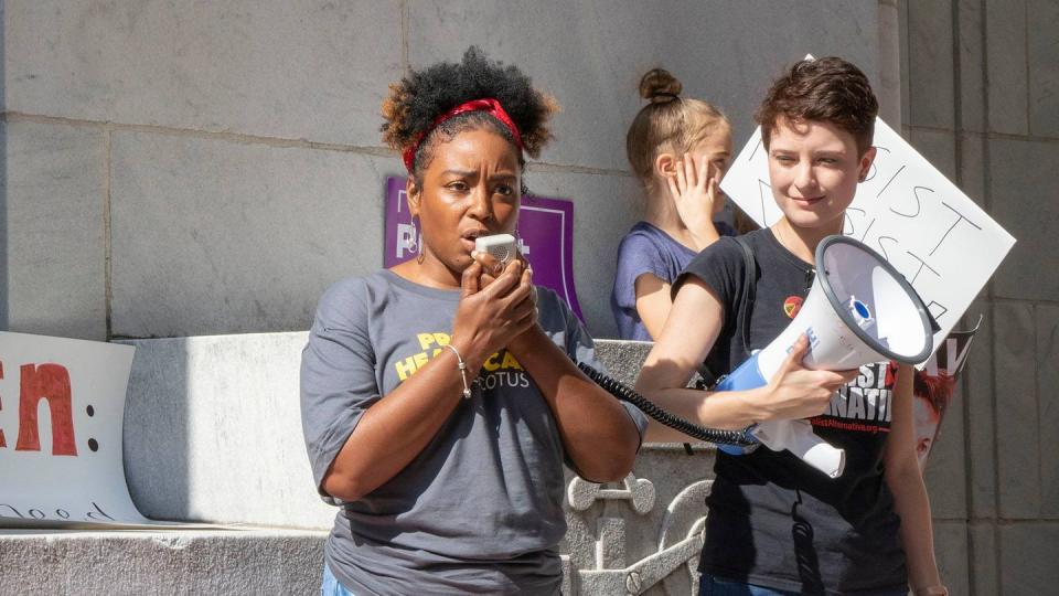 ohio womens alliance executive director and co founder rhiannon carnes, pictured at a protest