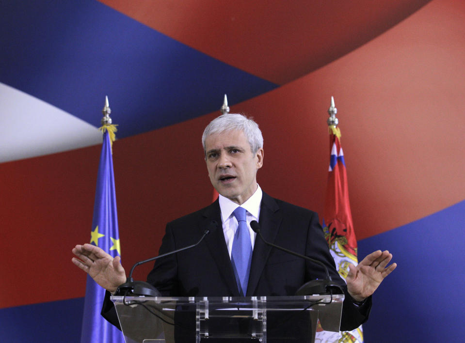 Serbian President Boris Tadic gestures as he delivers a speech during a news conference in Belgrade, Serbia, Friday, March 2, 2012. European Union leaders formally made Serbia a candidate for membership in the bloc, in a remarkable turnaround for a country considered a pariah just over a decade ago. (AP Photo/Darko Vojinovic)