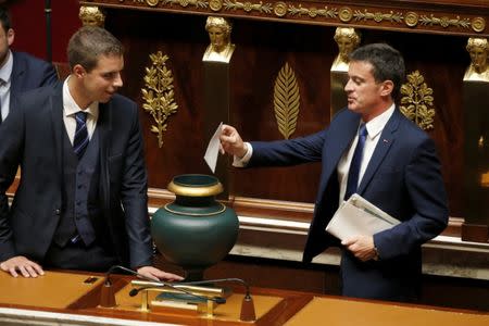 Newly-elected member of parliament Manuel Valls casts his vote for the election of the speaker during the opening session of the French National Assembly in Paris, France, June 27, 2017. REUTERS/Charles Platiau