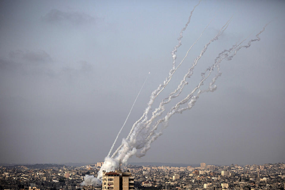 Rockets are launched from the Gaza Strip towards Israel, Monday, May. 10, 2021. (AP Photo/Khalil Hamra)