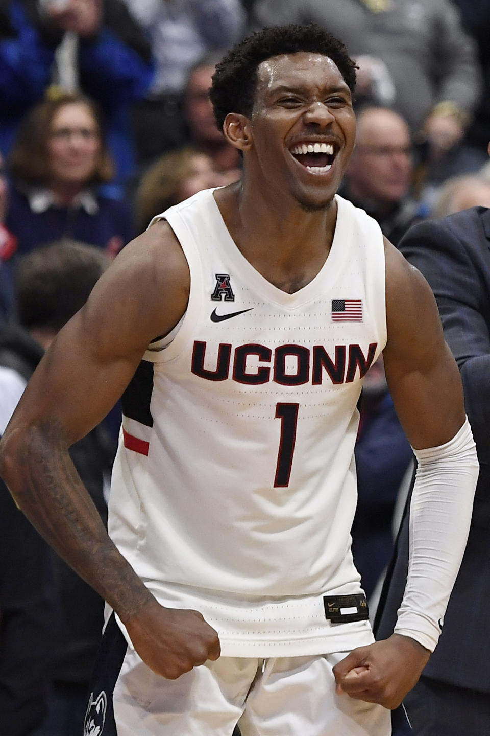 Connecticut's Christian Vital reacts in the second half of an NCAA college basketball game against Central Florida, Wednesday, Feb. 26, 2020, in Hartford, Conn. (AP Photo/Jessica Hill)