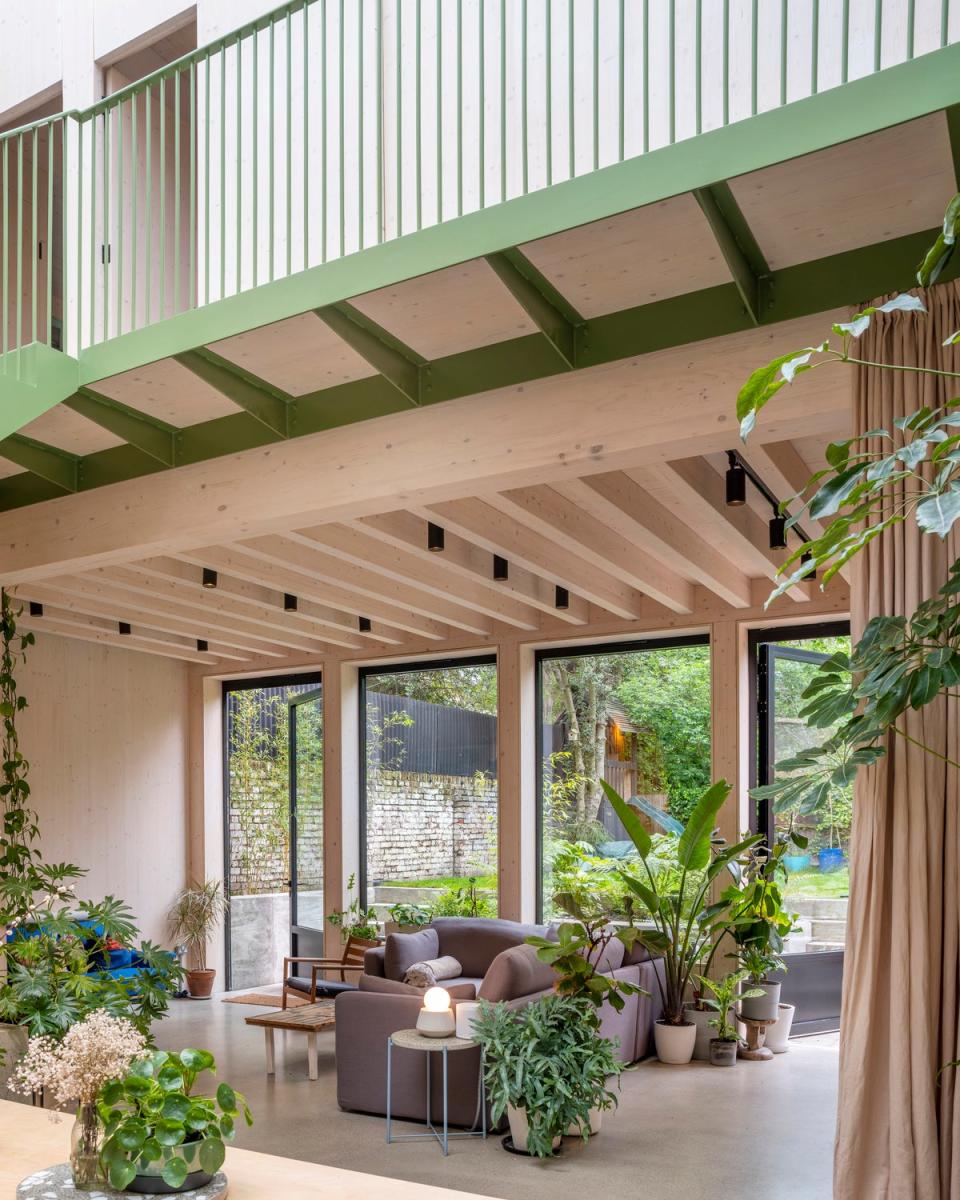 Curtains double as room dividers in the plant-filled house (Kilian O'Sullivan/VIEW)